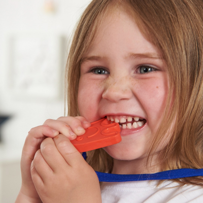 girl chewing chewbuddy red ghost