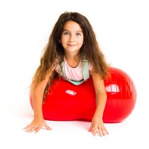 The benefits of ball therapy - Girl on peanut ball
